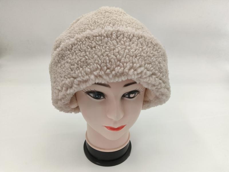 `Kremfärgad teddy bucket hat i sherpa-fleece