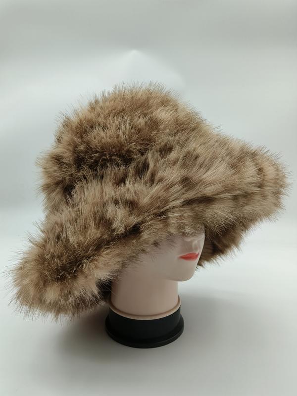 Brun och beige prickig bucket hat med bred brätte i fuskpäls