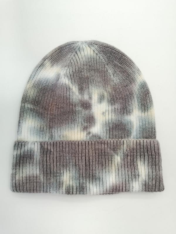 Ribbstickad mössa med tie-dye-mönster i grå