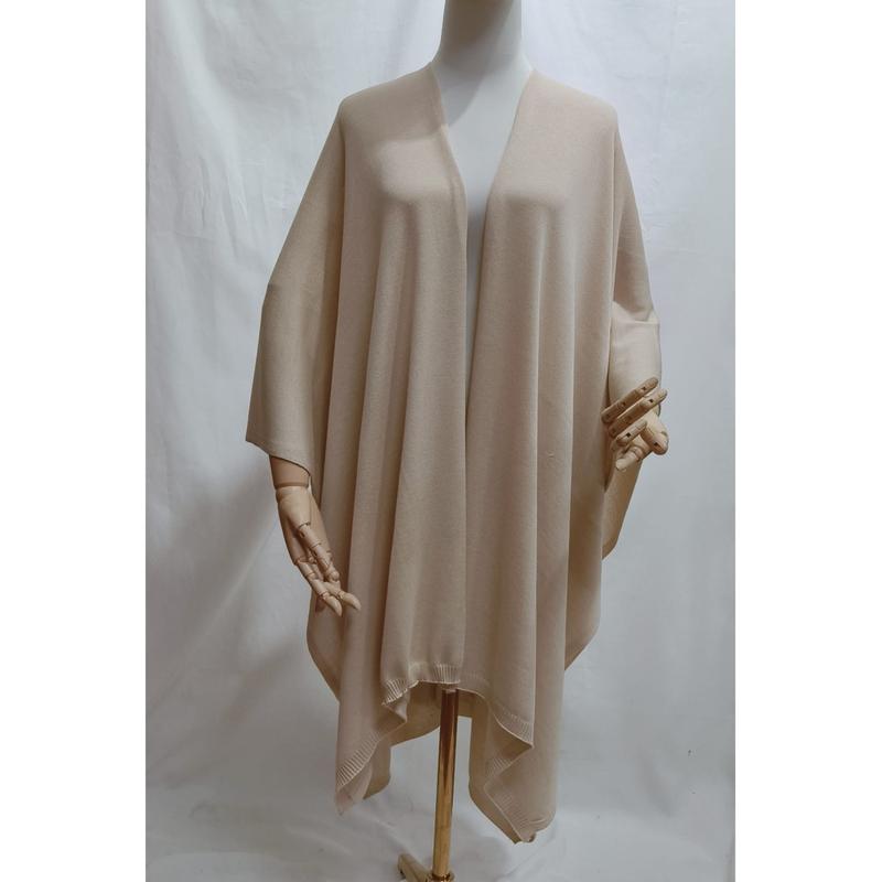 ""Cremevit oversized stickad poncho med öppen framsida och ribbad kant